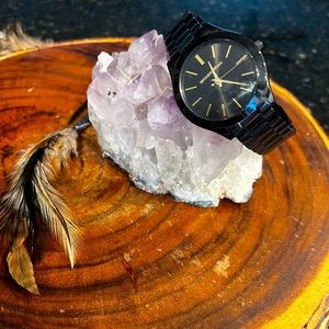 Black and gold Michael Kors watch